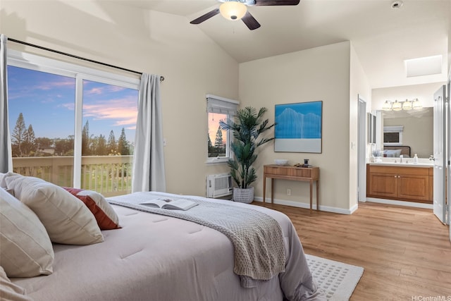 94-547 Lumiauau St, Waipahu, HI 96797 - bedroom featuring light wood-style flooring, vaulted ceiling, ensuite bath, access to exterior, and a wall mounted AC