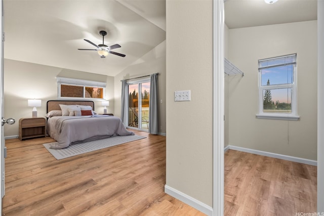 94-547 Lumiauau St, Waipahu, HI 96797 - bedroom featuring access to exterior, light wood-type flooring, lofted ceiling, and a ceiling fan