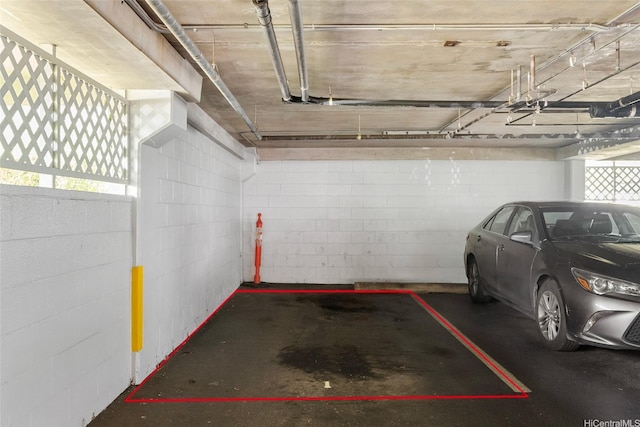 46-267 Kahuhipa St Unit C303, Kaneohe, HI 96744 - parking garage with concrete block wall