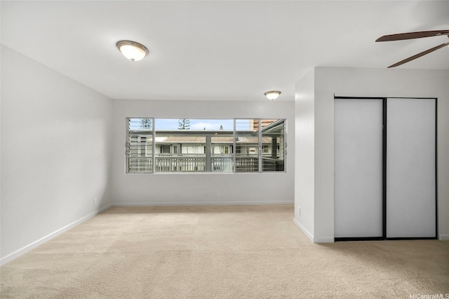 46-267 Kahuhipa St Unit C303, Kaneohe, HI 96744 - carpeted spare room with ceiling fan and baseboards
