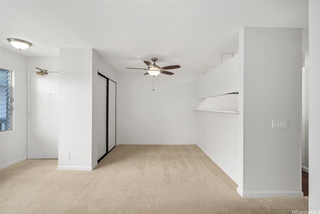 46-267 Kahuhipa St Unit C303, Kaneohe, HI 96744 - unfurnished bedroom featuring carpet flooring and ceiling fan