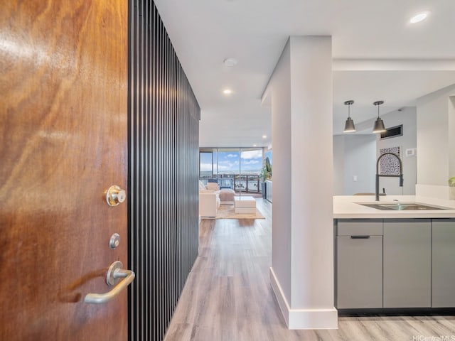415 S St Unit 1602, Honolulu, HI 96813 - corridor featuring light wood-style flooring and expansive windows