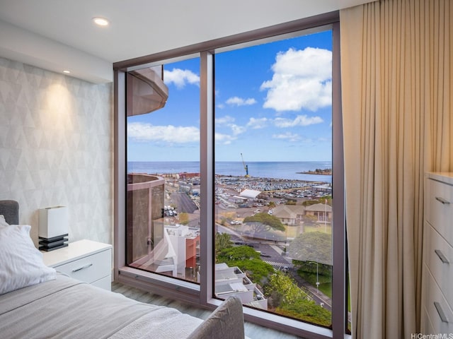415 S St Unit 1602, Honolulu, HI 96813 - bedroom with a water view, wood finished floors, and recessed lighting