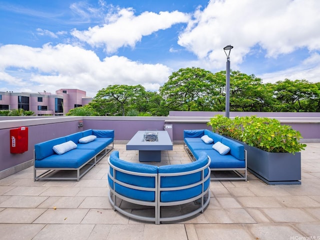 415 S St Unit 1602, Honolulu, HI 96813 - view of patio with an outdoor living space with a fire pit
