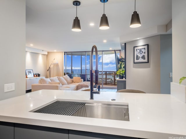 415 S St Unit 1602, Honolulu, HI 96813 - kitchen featuring open floor plan, hanging light fixtures, floor to ceiling windows, light countertops, and recessed lighting