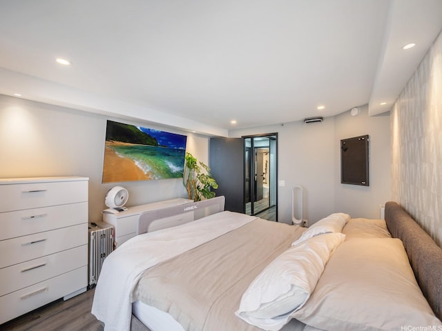 415 S St Unit 1602, Honolulu, HI 96813 - bedroom featuring dark wood-style flooring, recessed lighting, and radiator