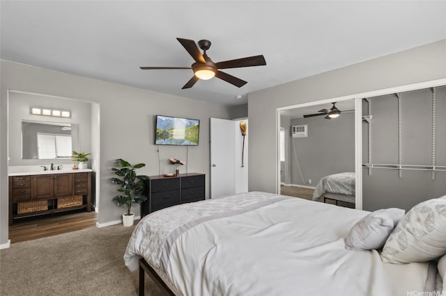 91-1017 Hoopili St Unit 66, Ewa Beach, HI 96706 - bedroom featuring dark colored carpet, a ceiling fan, a closet, and ensuite bath