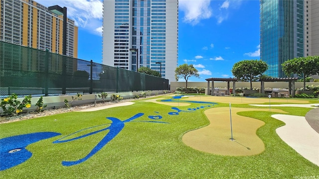1177 Queen St Unit 1805, Honolulu, HI 96814 - view of home's community with an area to practice putting and a pergola