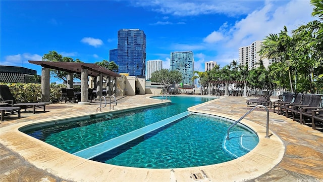 1177 Queen St Unit 1805, Honolulu, HI 96814 - community pool featuring a view of city, a patio, and a pergola