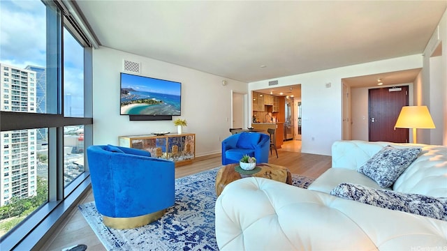 1177 Queen St Unit 1805, Honolulu, HI 96814 - living area with wood finished floors and baseboards