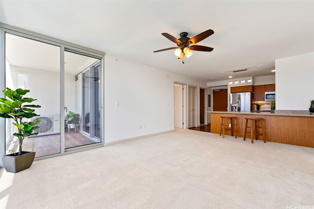 555 S St Unit 2303, Honolulu, HI 96813 - unfurnished living room with carpet, a ceiling fan, and recessed lighting