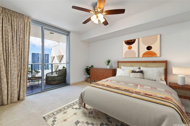 555 S St Unit 2303, Honolulu, HI 96813 - carpeted bedroom with access to outside, a city view, a wall of windows, and ceiling fan