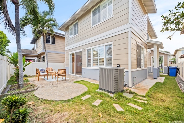 91-3082 Makalea Loop Unit 41, Ewa Beach, HI 96706 - rear view of property with a patio area and a fenced backyard