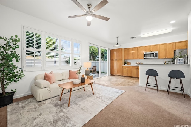 91-3082 Makalea Loop Unit 41, Ewa Beach, HI 96706 - living room with ceiling fan and light carpet