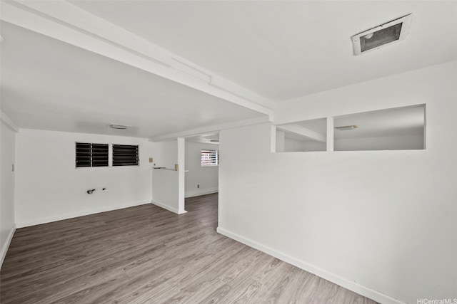 2963 Koali Rd Unit D, Honolulu, HI 96826 - spare room featuring wood finished floors and baseboards