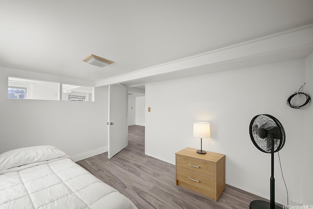 2963 Koali Rd Unit D, Honolulu, HI 96826 - bedroom with wood finished floors and baseboards