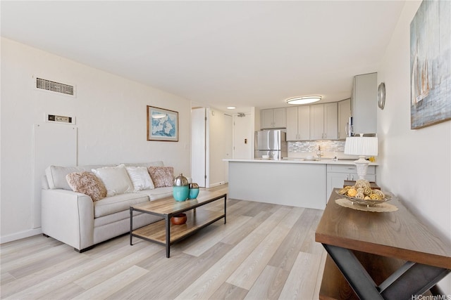411 Hobron Ln Unit 3402, Honolulu, HI 96815 - living area with light wood-style flooring