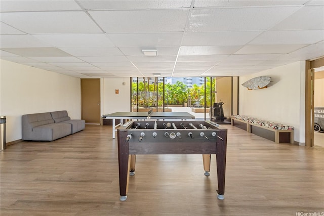 411 Hobron Ln Unit 3402, Honolulu, HI 96815 - recreation room featuring wood finished floors, expansive windows, and a drop ceiling