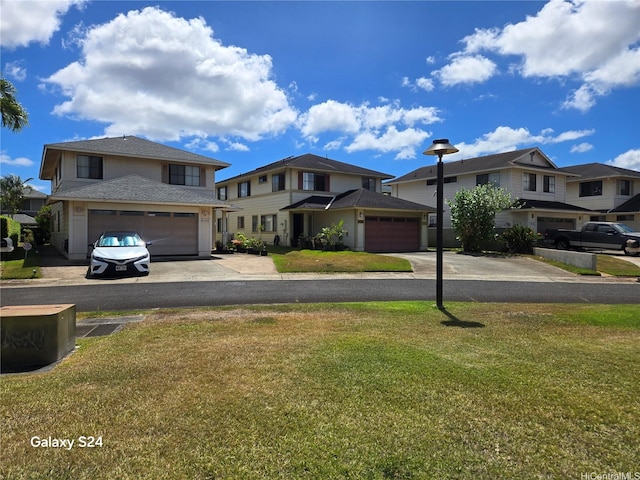 94-1008 Makakoa Loop, Waipahu, HI 96797 - traditional-style home with a garage, driveway, a front yard, and a residential view