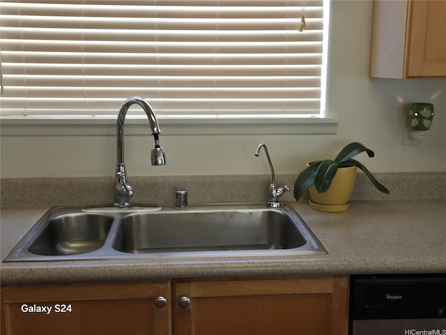 94-1008 Makakoa Loop, Waipahu, HI 96797 - kitchen view of dishwasher, light countertops, and brown cabinets