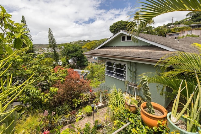 2316 Round Top Dr, Honolulu, HI 96822 - view of property exterior with roof with shingles