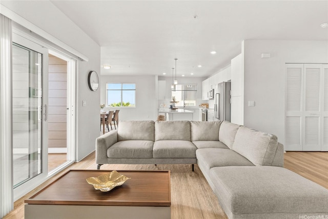 91-3575 Iwikuamoo St Unit 501, Ewa Beach, HI 96706 - living area with light wood-type flooring and recessed lighting