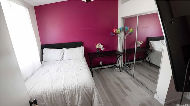 91-950 Laaulu St Unit 42E, Ewa Beach, HI 96706 - bedroom with wood finished floors and a closet