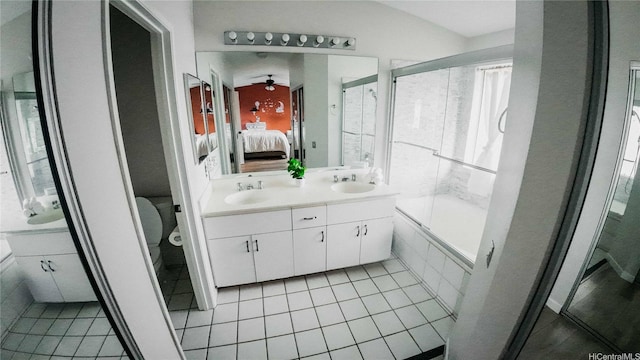 91-950 Laaulu St Unit 42E, Ewa Beach, HI 96706 - ensuite bathroom with double vanity, tile patterned flooring, and ceiling fan