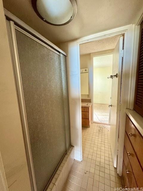 1676 Ala Moana Blvd Unit 1007, Honolulu, HI 96815 - full bath with a stall shower, vanity, and tile patterned floors