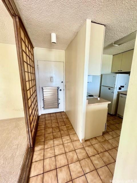 1676 Ala Moana Blvd Unit 1007, Honolulu, HI 96815 - corridor featuring a textured ceiling