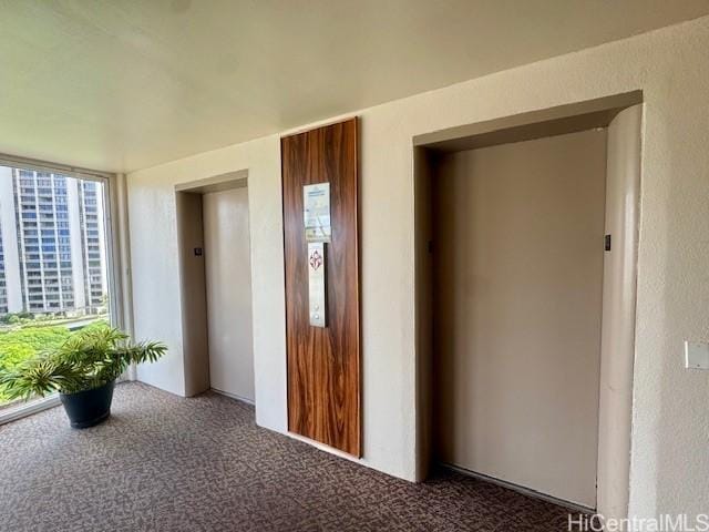 1676 Ala Moana Blvd Unit 1007, Honolulu, HI 96815 - hallway featuring carpet floors and elevator
