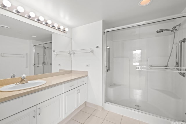 1314 Kalakaua Ave Unit 413, Honolulu, HI 96826 - bathroom featuring tile patterned floors, a shower stall, and vanity