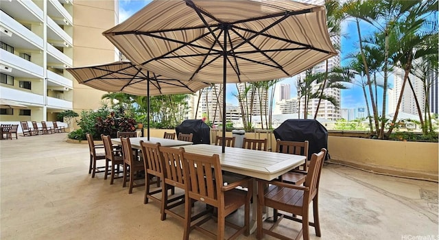 1860 Ala Moana Blvd Unit 1208, Honolulu, HI 96815 - view of patio featuring outdoor dining space and a grill
