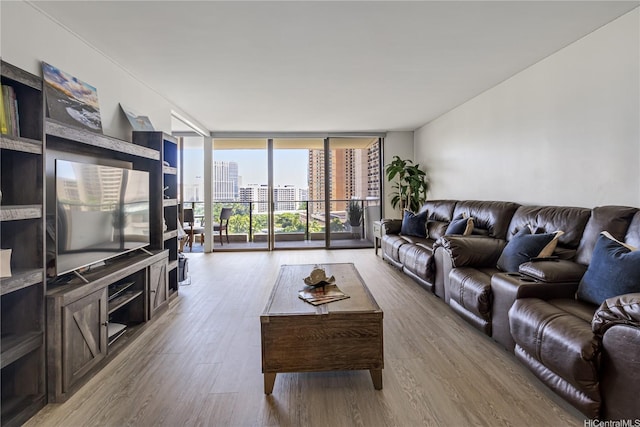 1860 Ala Moana Blvd Unit 1208, Honolulu, HI 96815 - living area featuring floor to ceiling windows and wood finished floors