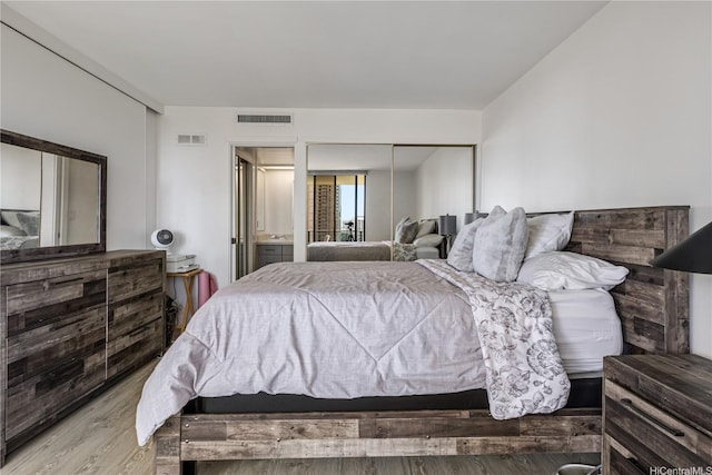 1860 Ala Moana Blvd Unit 1208, Honolulu, HI 96815 - bedroom featuring wood finished floors and a closet