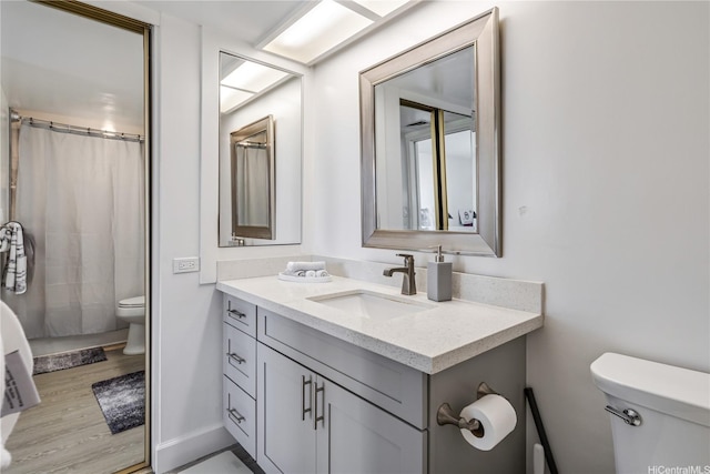 1860 Ala Moana Blvd Unit 1208, Honolulu, HI 96815 - full bathroom with vanity, wood finished floors, and a shower with shower curtain