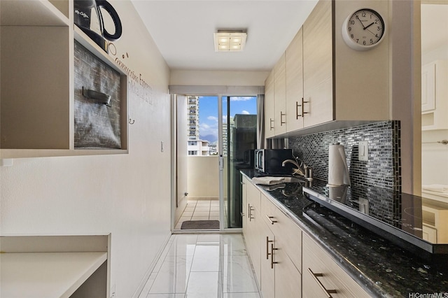 2450 Prince Edward St Unit 1201A, Honolulu, HI 96815 - kitchen featuring tasteful backsplash, light marble finish flooring, and dark countertops