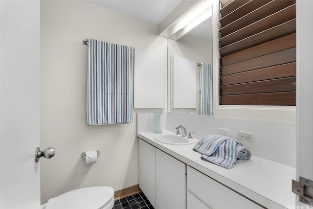 1789 Laukahi St, Honolulu, HI 96821 - bathroom with vanity and tile patterned flooring