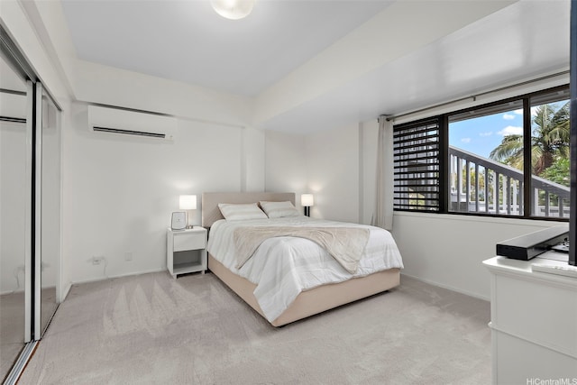 1789 Laukahi St, Honolulu, HI 96821 - bedroom with a wall mounted air conditioner, light colored carpet, and a closet