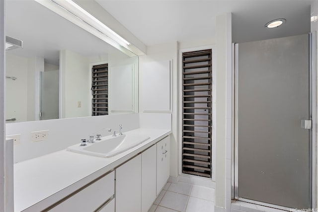 1789 Laukahi St, Honolulu, HI 96821 - full bathroom with vanity, tile patterned flooring, and a stall shower