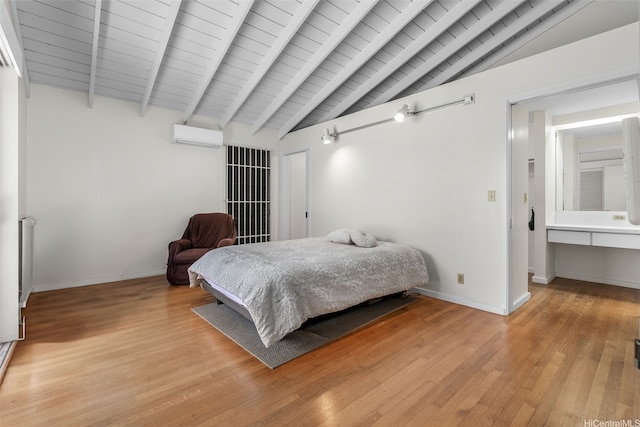 1789 Laukahi St, Honolulu, HI 96821 - bedroom featuring a wall mounted AC and light wood finished floors