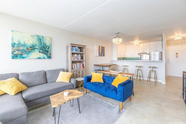 400 Hobron Ln Unit 2809, Honolulu, HI 96815 - living room with a chandelier and baseboards