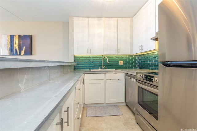 400 Hobron Ln Unit 2809, Honolulu, HI 96815 - kitchen with appliances with stainless steel finishes, white cabinets, tasteful backsplash, and under cabinet range hood