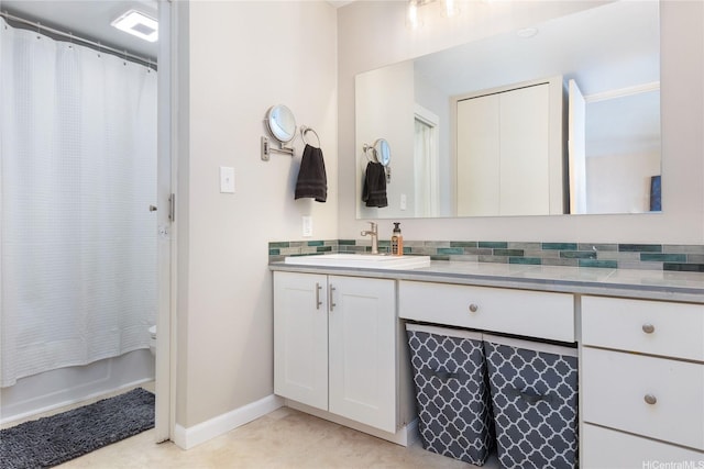 400 Hobron Ln Unit 2809, Honolulu, HI 96815 - bathroom featuring vanity and baseboards