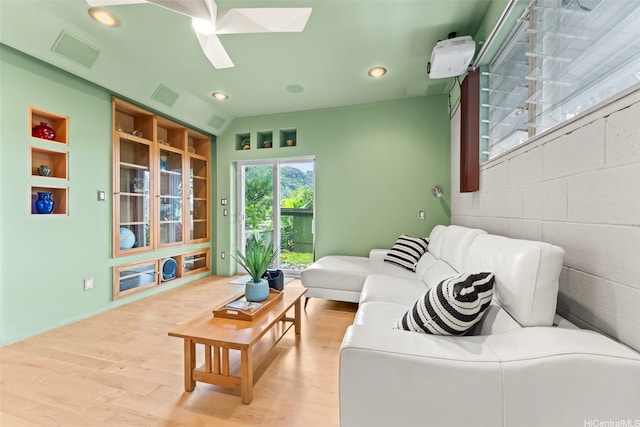 3233 Allan Pl, Honolulu, HI 96817 - living room with wood finished floors, a skylight, recessed lighting, and ceiling fan