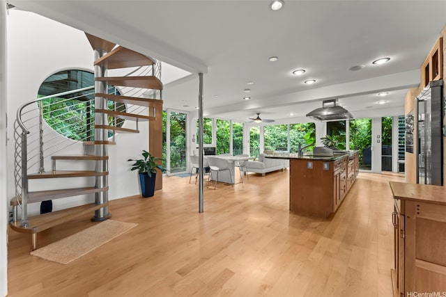 3233 Allan Pl, Honolulu, HI 96817 - kitchen with light wood-style floors, a kitchen island, a ceiling fan, open floor plan, and recessed lighting