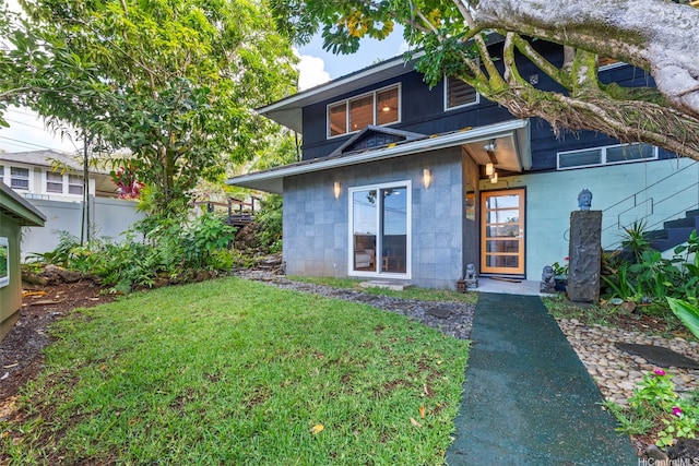 3233 Allan Pl, Honolulu, HI 96817 - rear view of house featuring concrete block siding