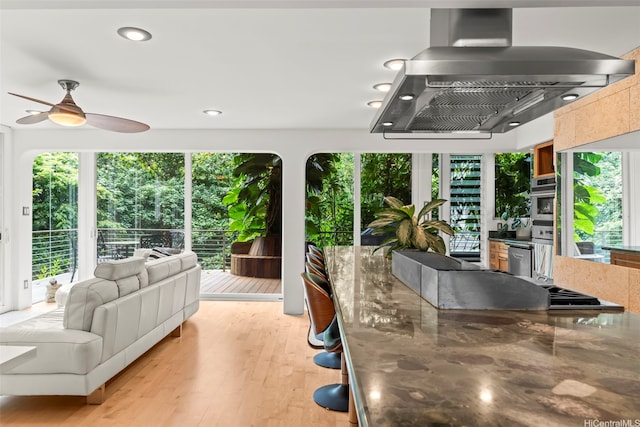 3233 Allan Pl, Honolulu, HI 96817 - sunroom / solarium with plenty of natural light, wood finished floors, and recessed lighting