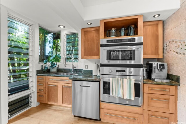 3233 Allan Pl, Honolulu, HI 96817 - kitchen featuring appliances with stainless steel finishes, open shelves, plenty of natural light, recessed lighting, and dark stone countertops