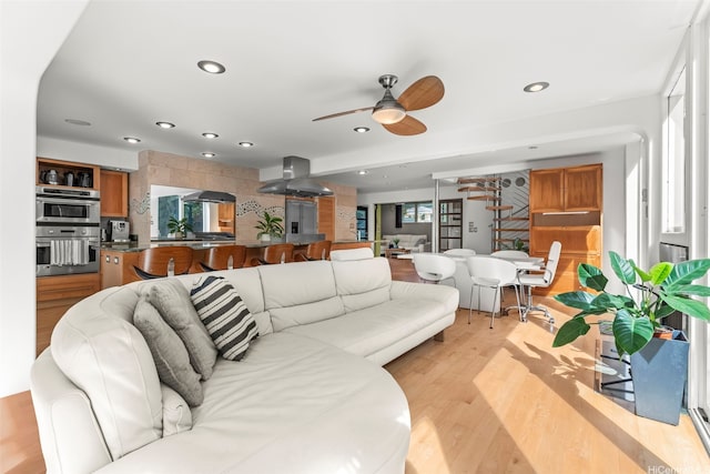 3233 Allan Pl, Honolulu, HI 96817 - living room featuring light wood-style floors, ceiling fan, and recessed lighting